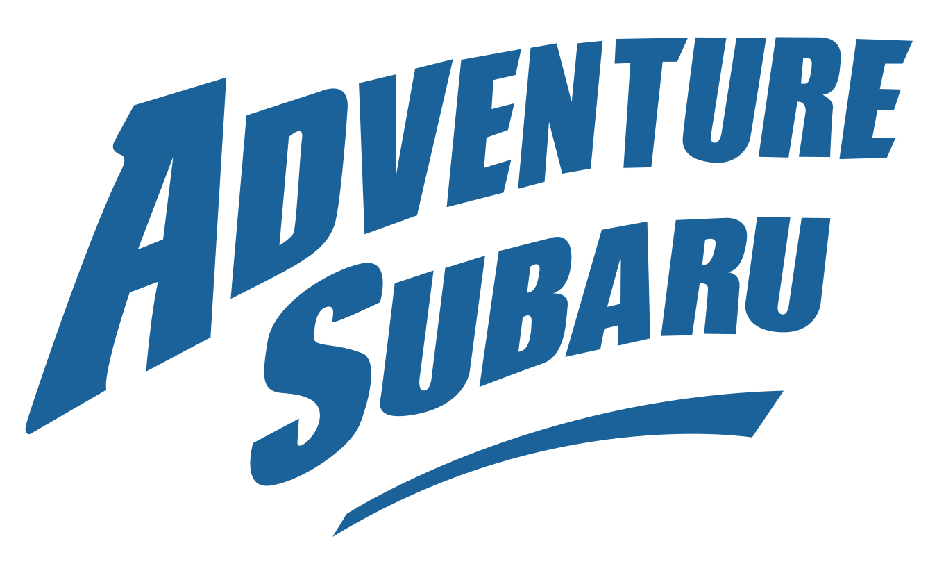 A blue and white logo for adventure subaru.