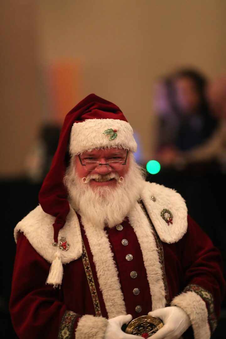 A man dressed as santa claus for christmas.